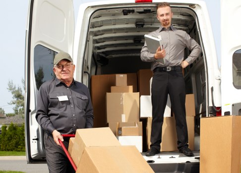 Removal team sorting recyclable materials during a Shoreditch move