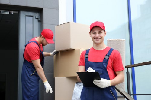 Removal team loading boxes in Shoreditch street