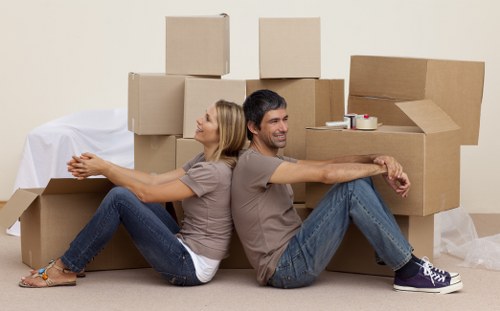 Professional movers handling boxes in a Shoreditch office relocation