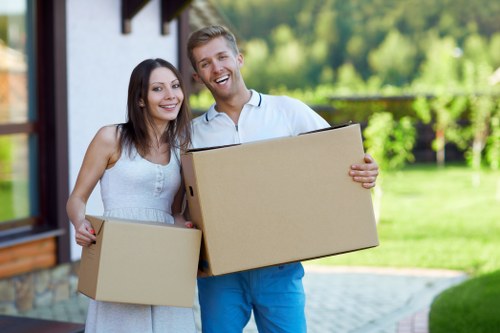 Loading household items into a removals van