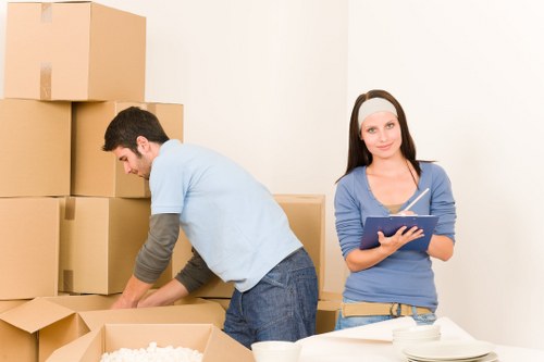 Professional movers loading furniture in Shoreditch
